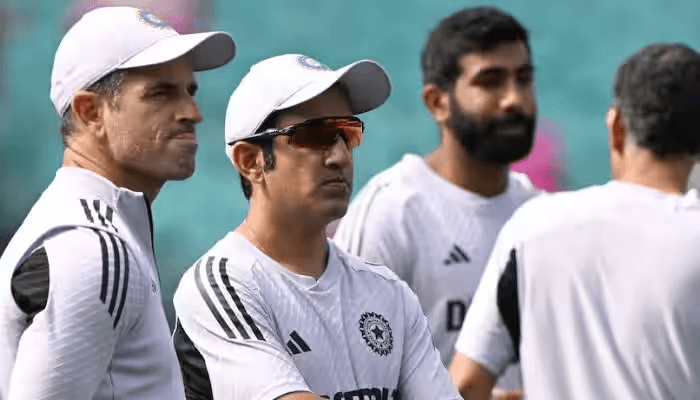 Rajeev Kumar providing physiotherapy to Indian cricket players, contributing to team fitness