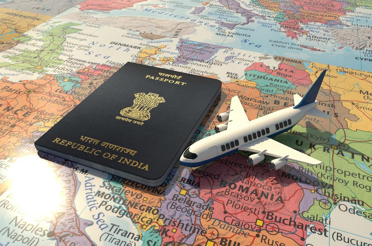 https://visadone.com/wp-content/uploads/2023/09/indian-passport-with-airoplane-on-world-map.jpg